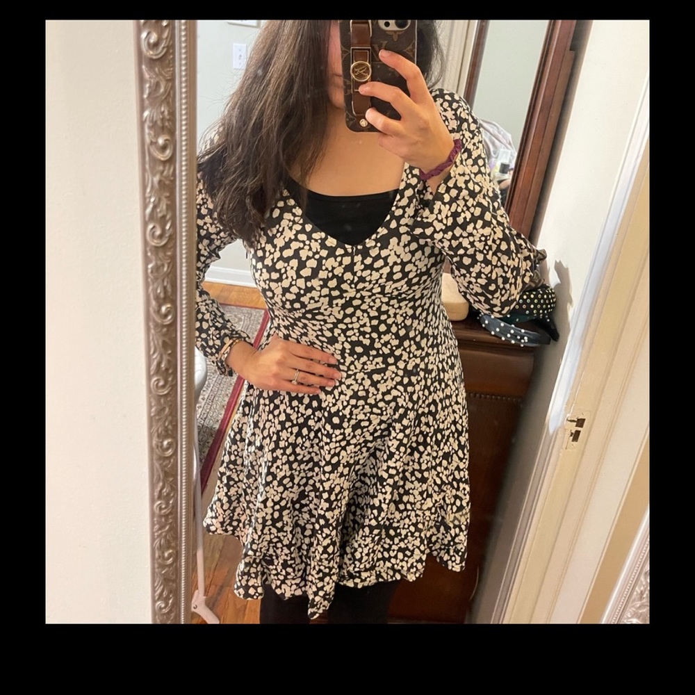 Trendy Abercrombie dress with cute back detail.
